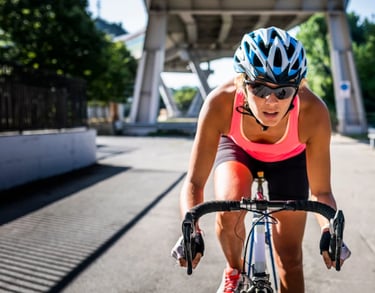 A woman riding her bike on the street