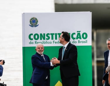 a man in a suit and tie is shaking hands