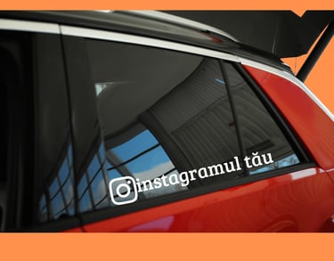 Custom white vinyl Instagram username sticker applied to a red car window for social media promotion.