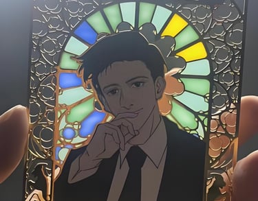 Translucent enamel pin finish showing light passing through colored enamel