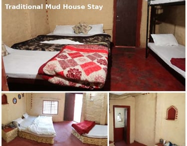 Traditional mud house accommodation at Jungle Lore Resort with rustic interiors