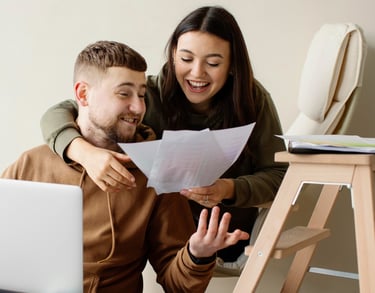 couple looking at loan and life insurance policy