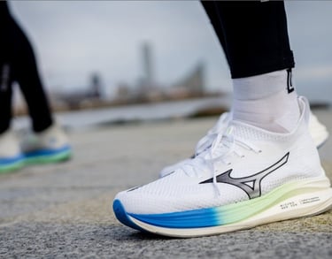 a person wearing a pair of mizuno zen shoes and socks
