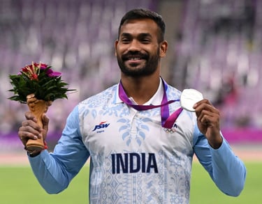 Kishore Jena with silver medal at Asian Games 2023