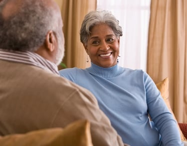 happy older couple having a discusion