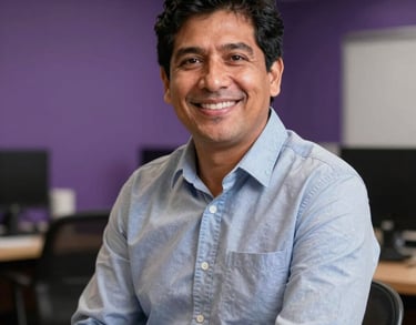 Portrait of a friendly South American consultant in a purple-toned office, looking professional and welcoming.
