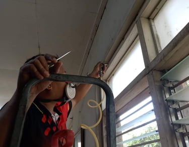 Dumaguete pest control technician sealing holes in preparation for fumigation, ensuring safety
