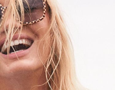 Woman laughing with unique designer frames