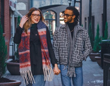 A happy couple walking through the shops at Fort Collins