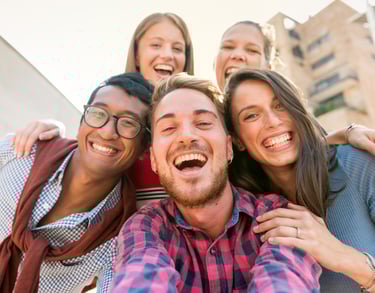 Group of friends outside laughing