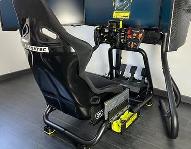a racing simulator with a steering wheel and a steering wheel