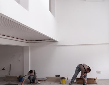 handymen performing maintenance and repair work inside a commercial Auckland property