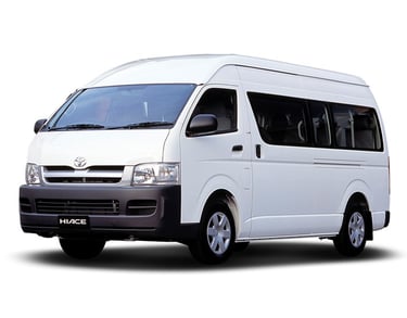 a white van with a white van parked in front of it