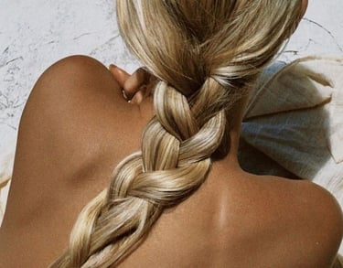 a woman with braided hair beach social media marketing