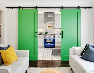 a living room with a green sliding door