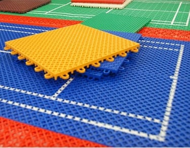 Interlocking PP tiles for outdoor multi-sport court construction