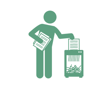 a person standing in front of a shredder