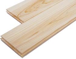 Light natural hinoki flooring planks showing detailed grain and tongue and groove edges.