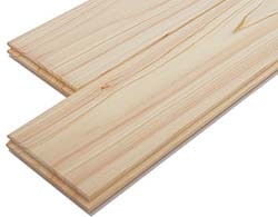 Natural cypress flooring planks with tongue and groove edges showing detailed grain patterns.