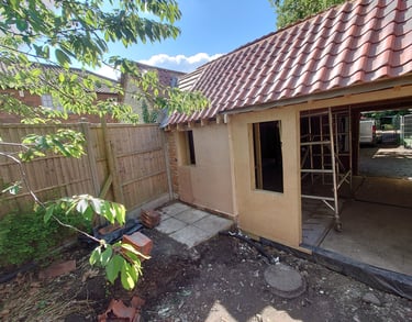 a house with a red tile roof and a red tile roof