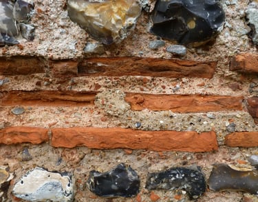 Roman wall tiles used as a string course at Burgh Castle, Norfolk
