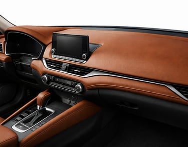 Premium leather dashboard and console covers fitted to enhance car interior appearance.