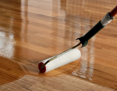 Wood floor is being finished after sanding to perfection