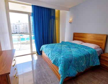  1 bedroom sunny beach first floor with balcony pool view 