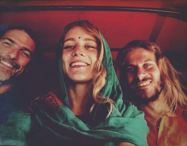 woman in a tuktuk with a green scarf in india