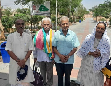 Pandit Daxesh Pandya with grateful family at Bindu Sarovar Siddhpur after Matrugaya pooja