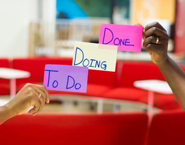 two people holding up signs that say don't do it
