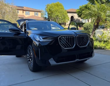 BMW X3 recently delivered to a client's driveway