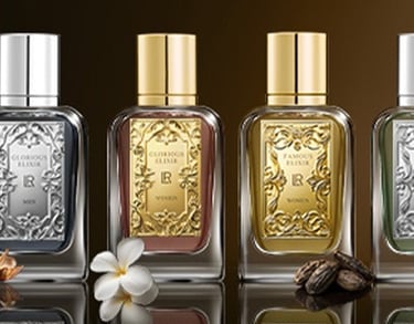 Luxury Iconic Elixirs perfume collection featuring four elegant glass bottles with gold and silver labels.