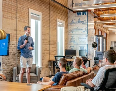 a man standing in front of a group of people