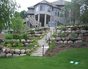 natural stone- retaining wall contractors near me 