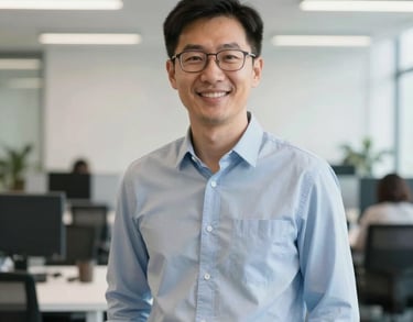 A friendly portrait of a logistics manager in a bright North American office setting, featuring clean lines and a modern, professional atmosphere.
