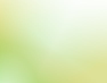 Soft lime green and white abstract gradient background with blurry soft light textures.