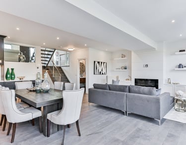 a living room with a couch and a table