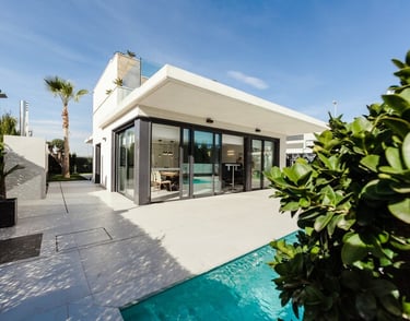 a modern house with a pool and a swimming pool