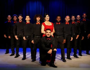 a group of people standing in front of a stage