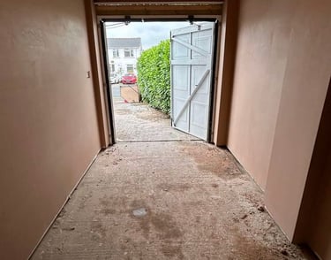 Plastered wall with a fine, smooth texture.