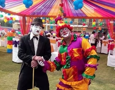 Joker For Kids Birthday Party a man in a clown mask and clown costume