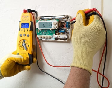 AC thermostat and wiring inspection by certified technician in UAE