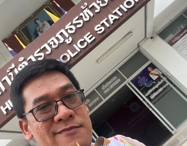 Lawyer at Police Station Sign “Lawyer assisting client at Pattaya Police Station – Chan Legal Adviso