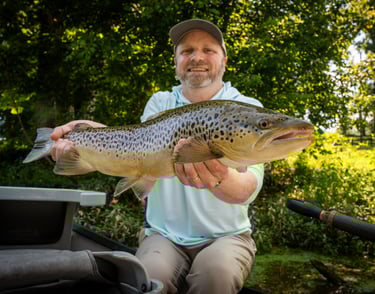 Check out this monster brown trout Cooper landed this month!
