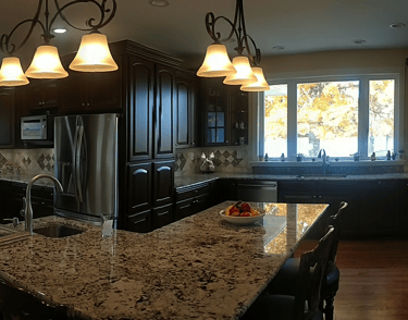 Cherry wood cabinets with granite countertop 