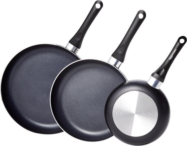 a group of three frying pans with a pancake