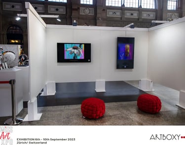 Art hanging on a gallery wall for the Swiss Art Expo Exhibition in Zurich Switerzland.