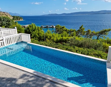 This photo shows the entire private pool with an unobstructed sea view.