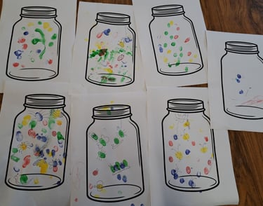 Toddler fingerprint craft activity at Little Fishies baby and toddler group in Elsenham.